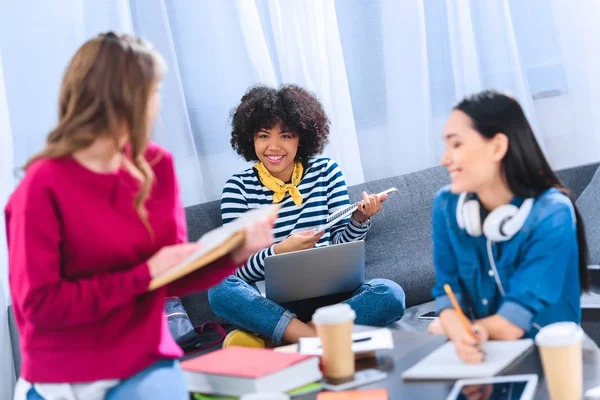 Multicultural group of young students studying together — Stock Photo