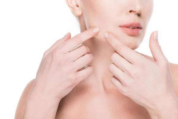 Cropped view of female touching own face by fingers isolated on white — Stock Photo