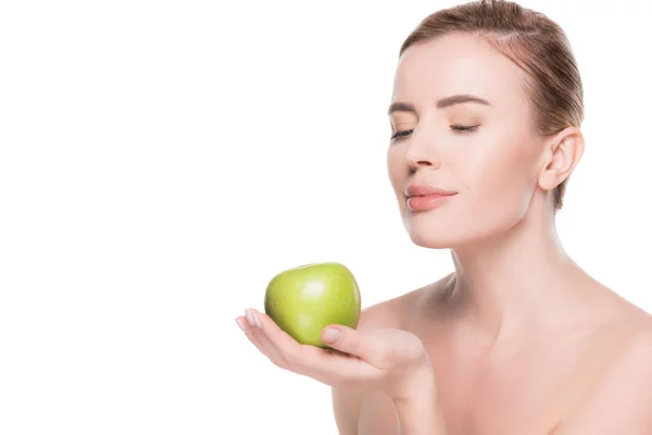 Portrait of woman with clean skin holding apple isolated on white — Stock Photo