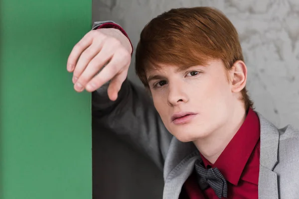 Portrait of young male fashion model dressed in suit — Stock Photo