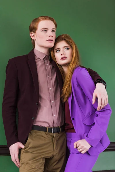 Low angle view of stylish young couple of models — Stock Photo
