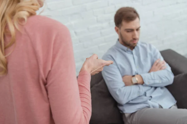 Partial view of mother and grown son having an argument at home — Stock Photo