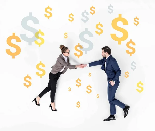 Collage créatif de partenaires d'affaires serrant la main avec des signes de chute du dollar sur fond — Photo de stock
