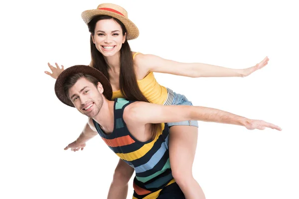 Happy boyfriend piggybacking his cheerful girlfriend, isolated on white — Stock Photo