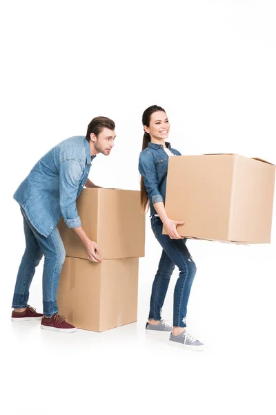 Young couple relocating with carton boxes, isolated on white — Stock Photo