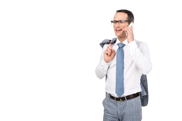 Handsome adult businessman talking by phone — Stock Photo
