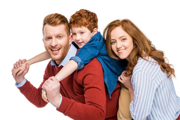 Happy parents with cute little son smiling and looking at camera isolated on white — Stock Photo