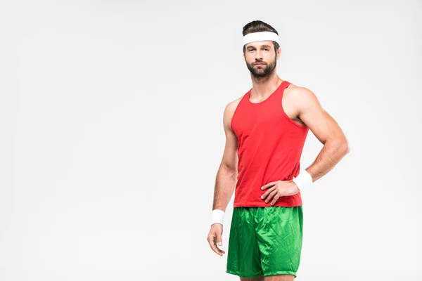 Sportsman posing in retro sportswear, isolated on white — Stock Photo