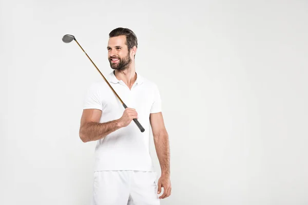 Sorrindo golfista em sportswear branco com clube de golfe, isolado em cinza — Fotografia de Stock