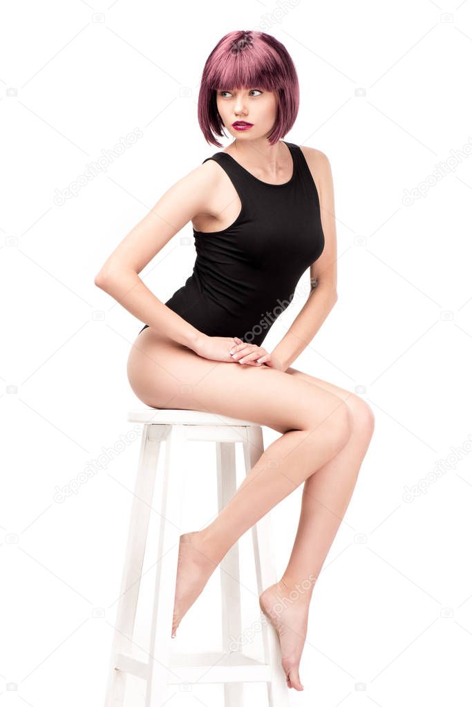 girl with purple hair posing on chair