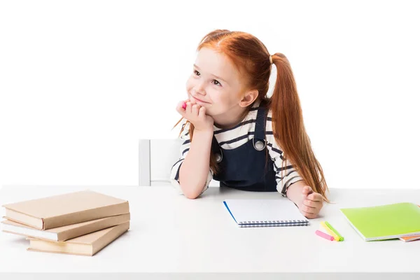 Schoolgirl drawing in notebook — Stock Photo, Image