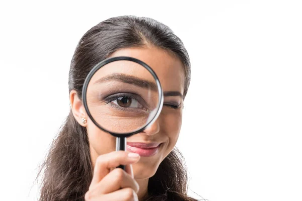 Businesswoman holding magnifying glass — Stock Photo, Image