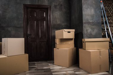 cardboard boxes in room
