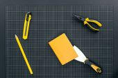 Notebook and tools on graph paper