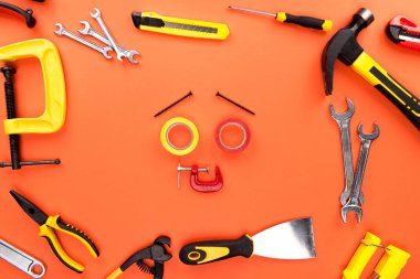 Smiley face made of tools clipart
