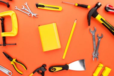 yellow notebook and reparement tools clipart