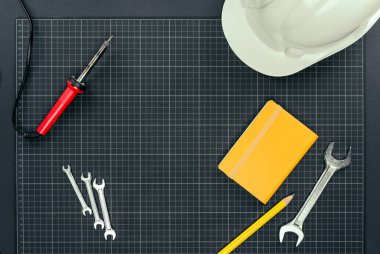 Reparement tools on graph paper  clipart