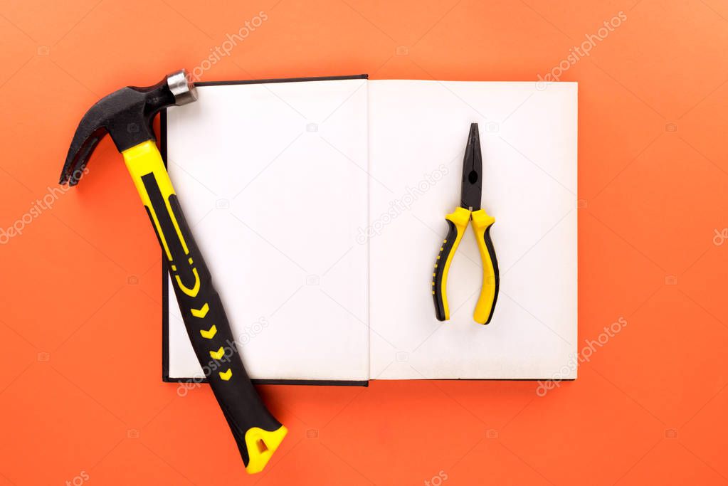 open book and tools