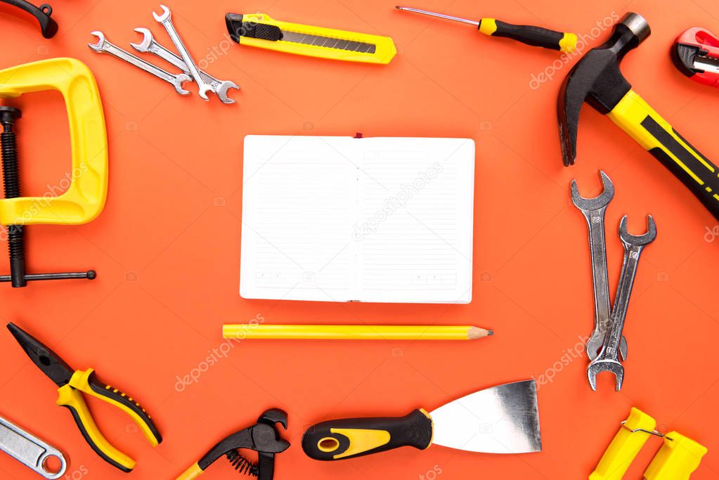 open notebook and reparement tools