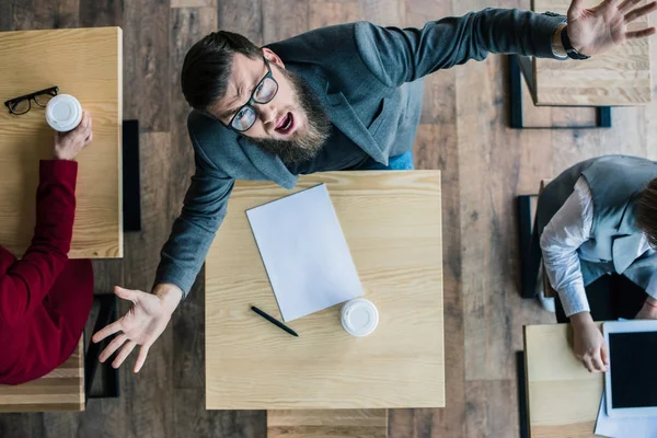 Businessman shouting at camera — Stock Photo, Image