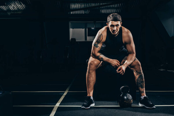 Athletic sportsman in gym