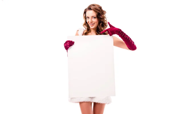 Santa girl pointing at empty board — Stock Photo, Image