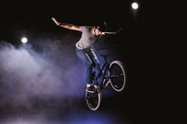 bmx cyclist performing stunt