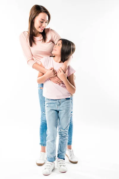 Mother hugging daughter — Stock Photo, Image