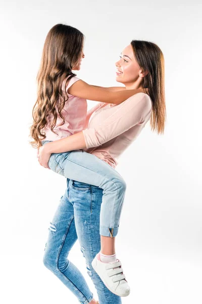 Mother holding daughter — Stock Photo, Image