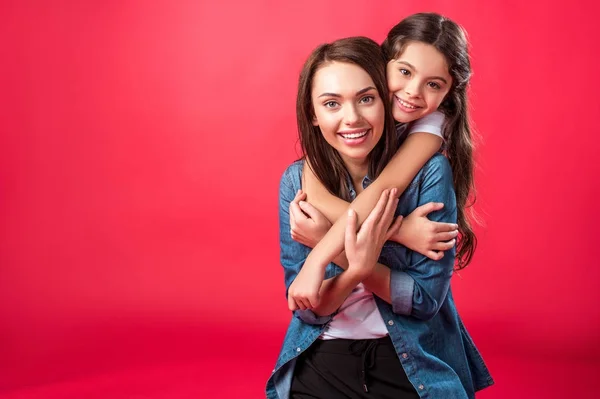 Daughter hugging mother — Stock Photo, Image
