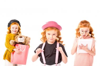 aynı çocuk farklı kıyafetler üzerinde beyaz izole ayakta ile kolaj