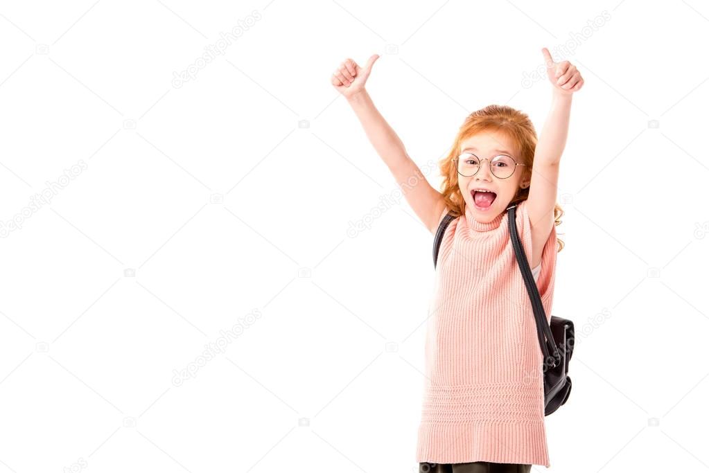 red hair kid with backpack showing thumbs up isolated on white 