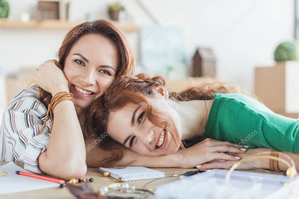 young women at workplace in handmade accessories workshop