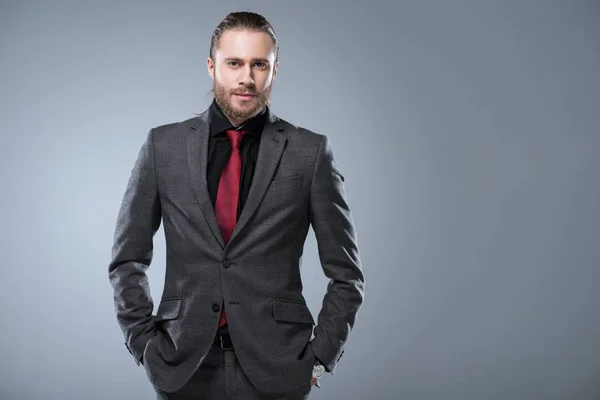 Hombre Serio Camisa Negra Con Corbata Roja Mirando Reloj Pulsera Foto de stock 177209220 EdZbarzhyvetsky