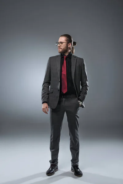 Businessman Glasses Looking Away Hand Pocket Jacket Isolated Gray — Stock Photo, Image