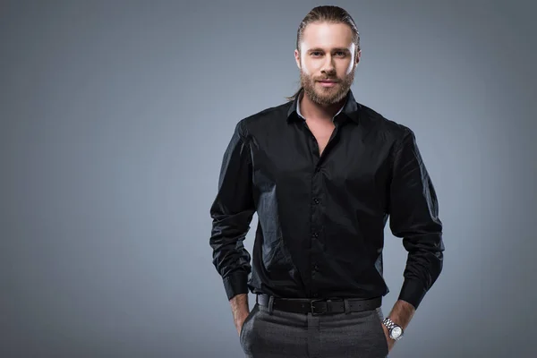 Cheerful Young Man Black Shirt Hands Pocket Looking Camera Isolated — Stock Photo, Image