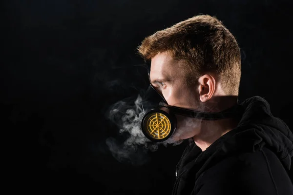 Man Black Hood Wearing Protective Filter Mask Surrounded Clouds Smoke — Stock Photo, Image