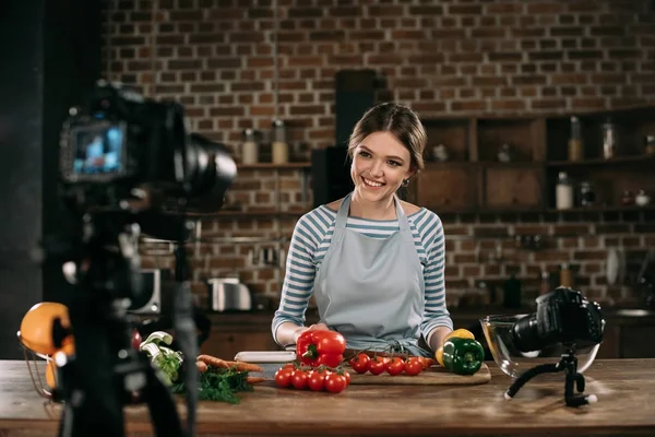 Young food blogger smiling to camera — Stock Image Young Food Blogger Smiling Camera Stock Photo