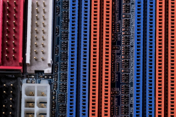 close up view of computer motherboard colorful ports