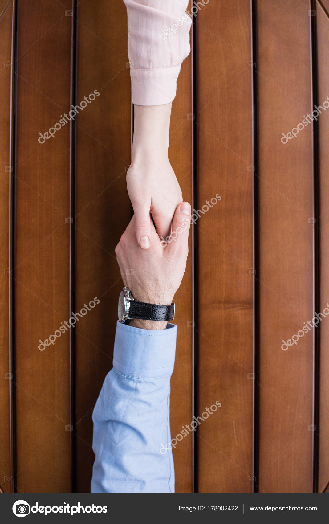 girlfriend and boyfriend holding hands