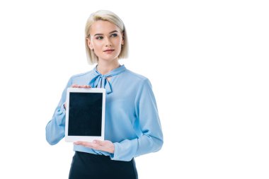 blonde businesswoman presenting tablet with blank screen, isolated on white