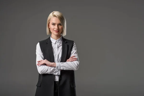 Portrait Fashionable Woman Arms Crossed Looking Camera Isolated Grey — Stock Photo, Image