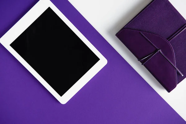 Top View Tablet Notebook White Purple Surface — Stock Photo, Image