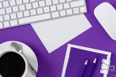 top view of workspace with cup of coffee and computer keyboard clipart