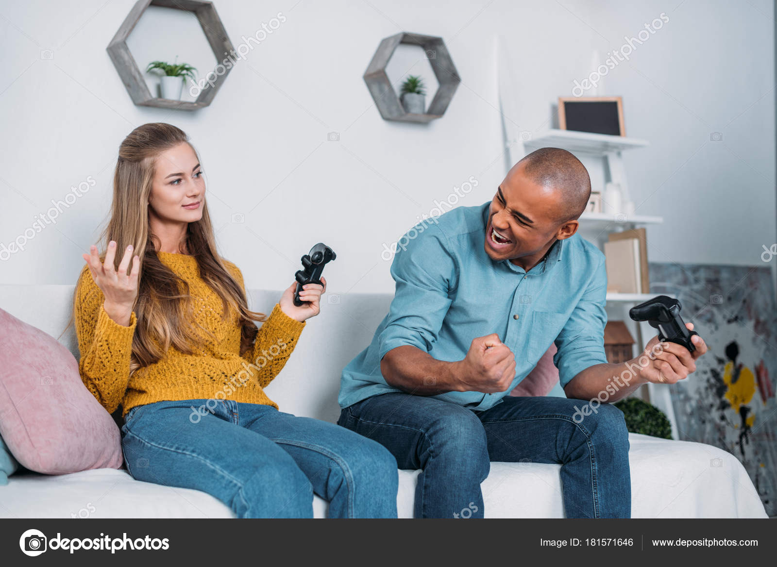 African American Boyfriend Winning Video Game Girlfriend Stock Photo by  ©EdZbarzhyvetsky 181571646