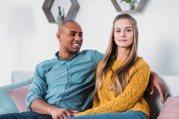 Multicultural Couple Holding Hands Sofa — Stock Photo, Image