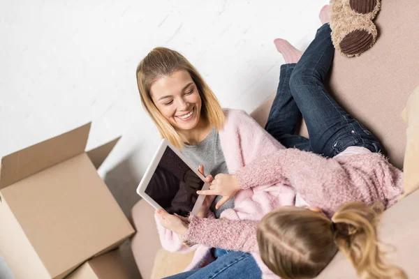 Happy Mother Daughter Using Digital Tablet Blank Screen While Moving — Stock Photo, Image