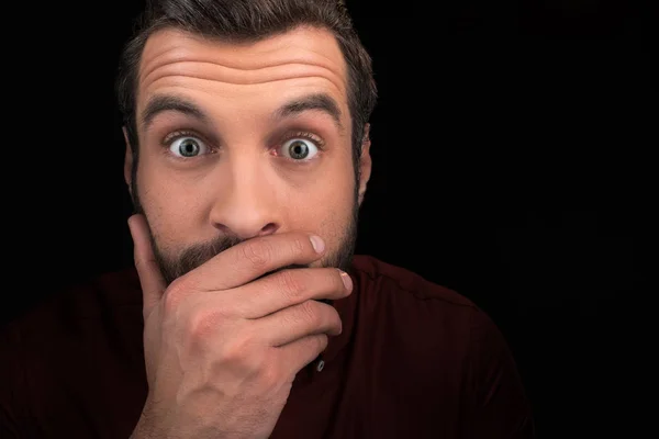 Portrait Shocked Man Covering Mouth Isolated Black — Stock Photo, Image