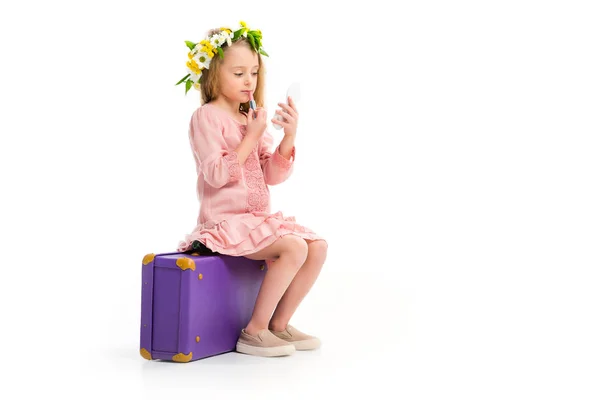 Side View Kid Sitting Purple Suitcase Doing Makeup Lipstick Isolated — Stock Photo, Image