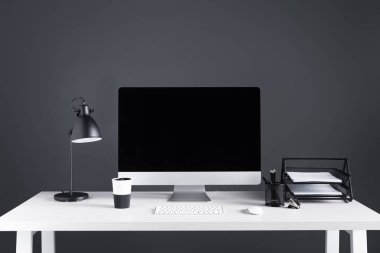 modern desktop computer with blank screen with keyboard and computer mouse at workplace  clipart